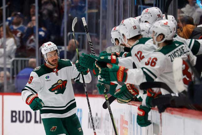 Mar 29, 2023; Denver, Colorado, USA; Minnesota Wild center Frederick Gaudreau (89) celebrates with the bench after his goal in the third period against the Colorado Avalanche at Ball Arena.