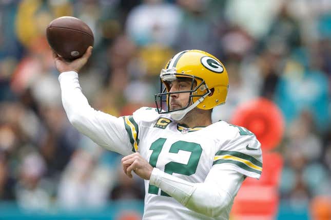 Dec 25, 2022; Miami Gardens, Florida, USA; Green Bay Packers quarterback Aaron Rodgers (12) throws the football during the second quarter against the Miami Dolphins at Hard Rock Stadium.