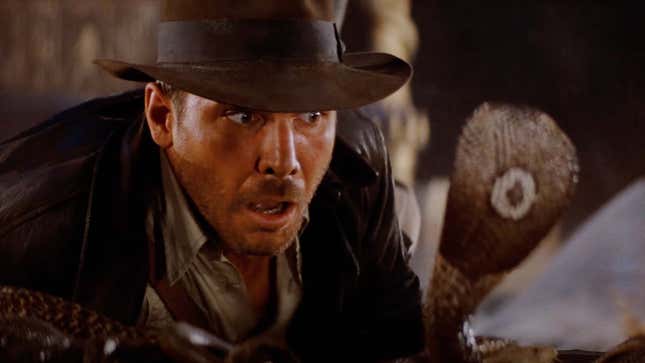 An image shows Indiana Jones reacting to a large cobra. 