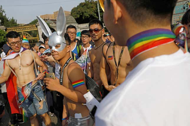 Participants take part in Taipei’s pride parade on October 28, 2017.