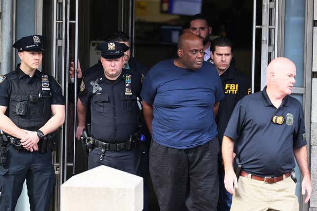 Suspect Frank James is led by police from Ninth Precinct after being arrested for his connection to the mass shooting at the 36th St subway station on April 13, 2022 in New York City. James, the suspected gunman in Tuesday’s shooting, was arrested this afternoon after a hotline caller’s tip. James is alleged to have shot 10 people, critically injuring five, on the N train during Tuesday’s morning rush hour. 