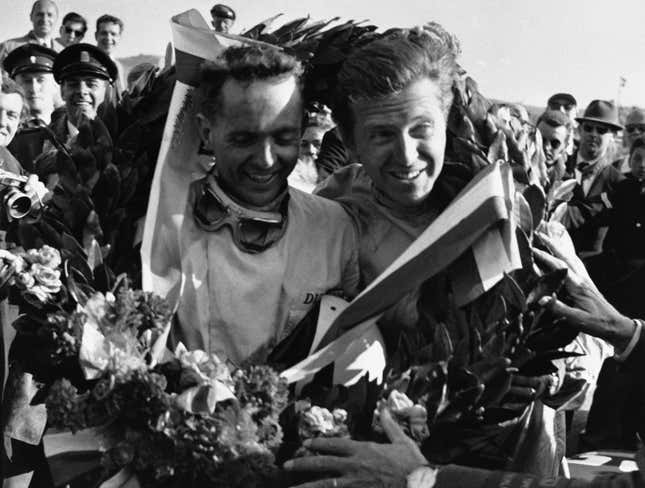 Phil Hill (left) and Wolfgang von Trips (right) share a laurel wreath at the 1961 Dutch Grand Prix.