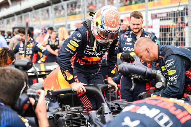 Jun 18, 2023; Montreal, Quebec, CAN; Red Bull Racing driver Max Verstappen (NED) pulls out of his car prior to the Canadian Grand Prix at Circuit Gilles Villeneuve.
