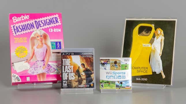 The game packaging for this year's Video Game Hall of Fame Inductees, and a photo of a classic Computer Space cabinet.