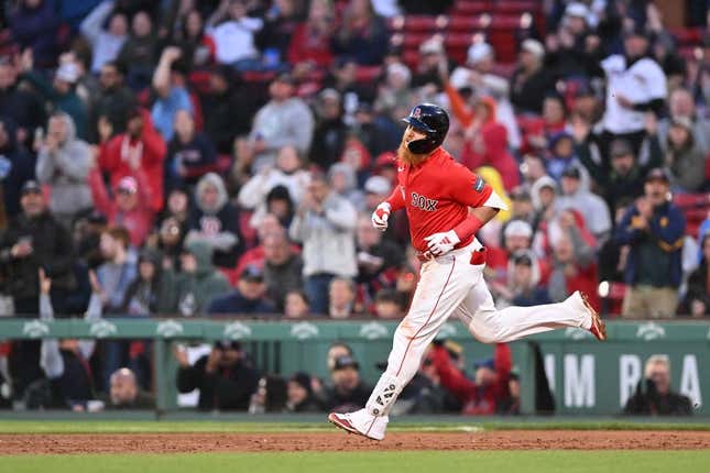 May 17, 2023; Boston, Massachusetts, USA;  Boston Red Sox designated hitter Justin Turner (2) runs the bases after hitting a two run home run against the Seattle Mariners during the second inning at Fenway Park.