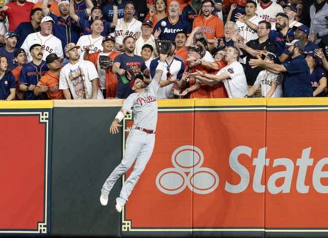 Apr 28, 2023; Houston, Texas, USA; Philadelphia Phillies right fielder Nick Castellanos (8) catches Houston Astros third baseman Alex Bregman (2) (not pictured) fly ball for an out in the first inning at Minute Maid Park.