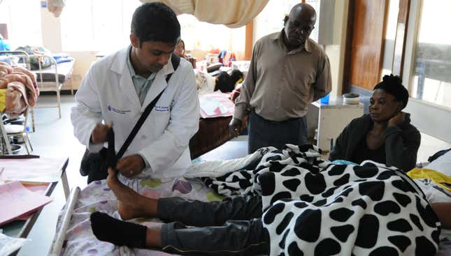 Omar Siddiqi attends to a patient