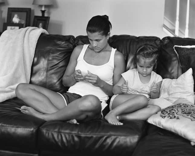 Image for article titled Photographer removes our smartphones to show our strange and lonely new world