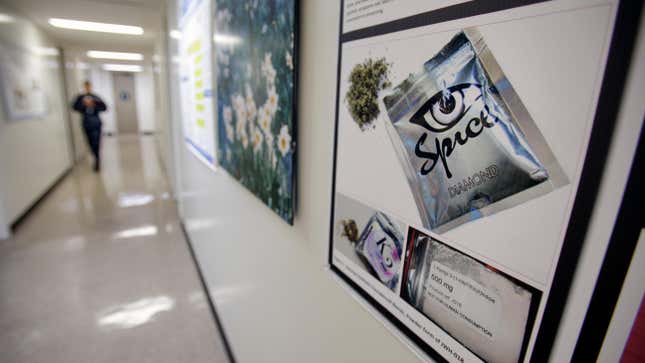 In a photo taken Tuesday, Dec. 6, 2011, a poster warning of the effects of the drug known as ‘spice’ hangs on a wall at the Naval Hospital, in San Diego. 