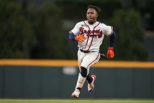 Apr 24, 2023; Cumberland, Georgia, USA; Atlanta Braves second baseman Ozzie Albies (1) runs the bases after hitting a three run triple against the Miami Marlins during the eighth inning at Truist Park.