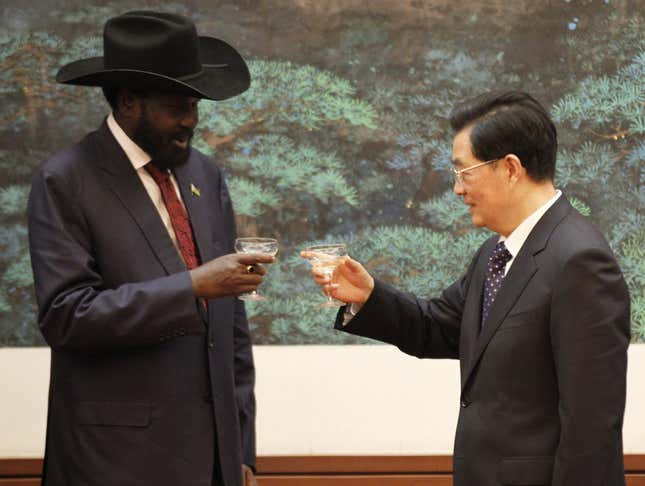 South Sudan's president Salva Kiir and then Chinese president Hu Jintao toast to each other in the Great Hall of the People in Beijing on 24 April 2012.