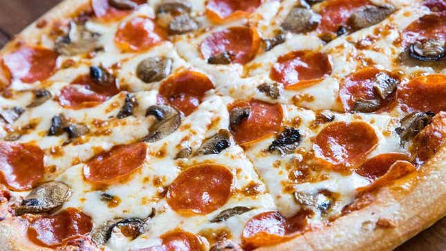 Close-up of mushroom and pepperoni pizza