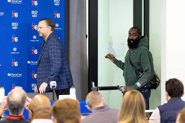 Feb 15, 2022; Camden, NJ, USA; Philadelphia 76ers guard James Harden (R) and president of basketball operations Daryl Morey (L) enter a press conference at Philadelphia 76ers Training Complex.