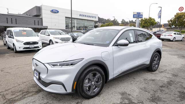 The Ford Motor Co. Mustang Mach-E electric sports utility vehicle (SUV) for sale at a dealership in Colma, California, U.S., on Wednesday, June 30, 2021.