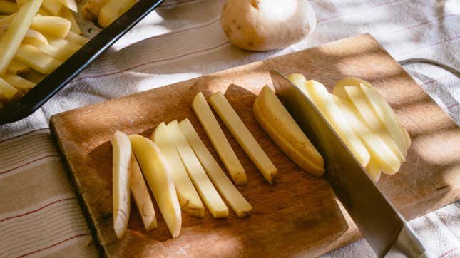 Image for article titled How to Chop a Potato Without It Sticking to Your Knife