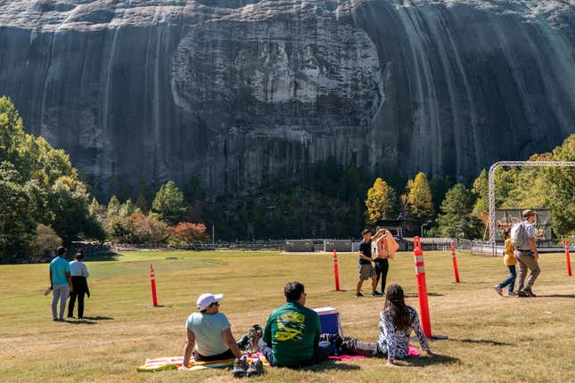Visitors are seen at Stone Mountain Park on October 15, 2022, in Stone Mountain, Georgia.