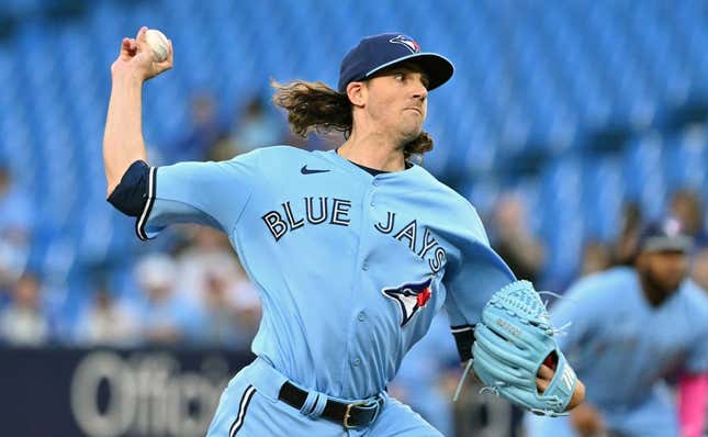 Aug 28, 2023; Toronto, Ontario, CAN;  Toronto Blue Jays starting pitcher Kevin Gausman (34) delivers a pitch against the Washington National in the first inning at Rogers Centre.