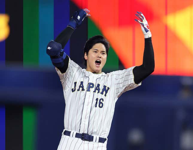Shohei Ohtani celebrates after hitting a 9th-inning double