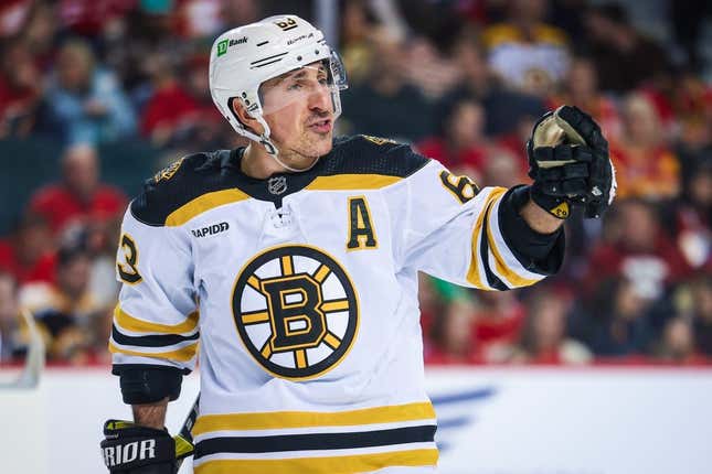 Feb 28, 2023; Calgary, Alberta, CAN; Boston Bruins left wing Brad Marchand (63) reacts during the second period against the Calgary Flames at Scotiabank Saddledome.