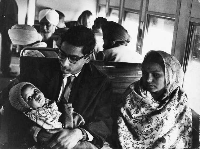 Museum number: PHY.07736 T. S. Satyan, Young couple and baby on a train journey, 1970, H. 26.6 cm, W. 35.3 cm, Silver gelatin print.