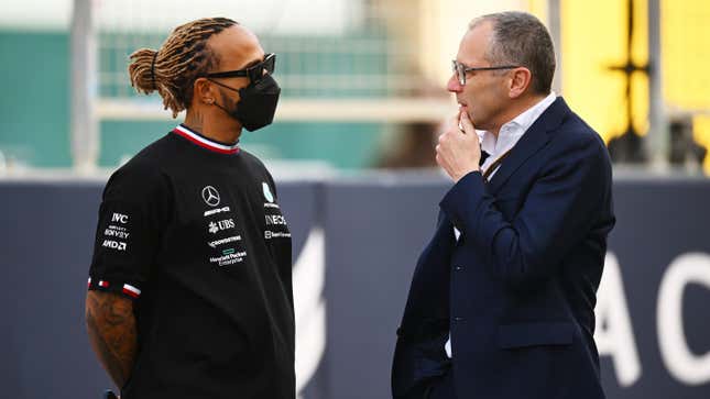 Lewis Hamilton (left) and Stefano Domenicali (right) at the 2022 Bahrain Grand Prix.