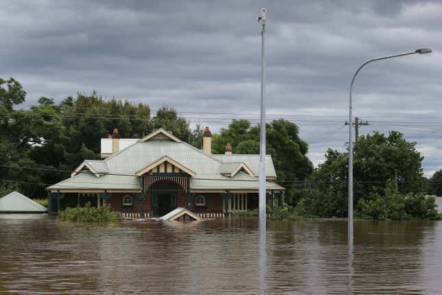 A home is seen inundated by floodwaters along the Hawkesbury River in Windsor on March 9, 2022 in Sydney, Australia.