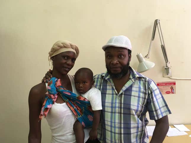 Zacheas Chikasa (right), who suffered a stroke in 2015, with his wife and grandson