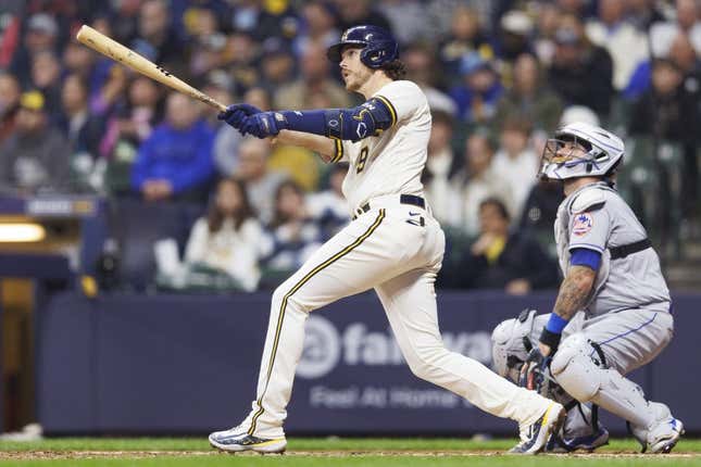 Apr 4, 2023; Milwaukee, Wisconsin, USA;  Milwaukee Brewers third baseman Brian Anderson (9) hits a home run during the sixth inning against the New York Mets at American Family Field.