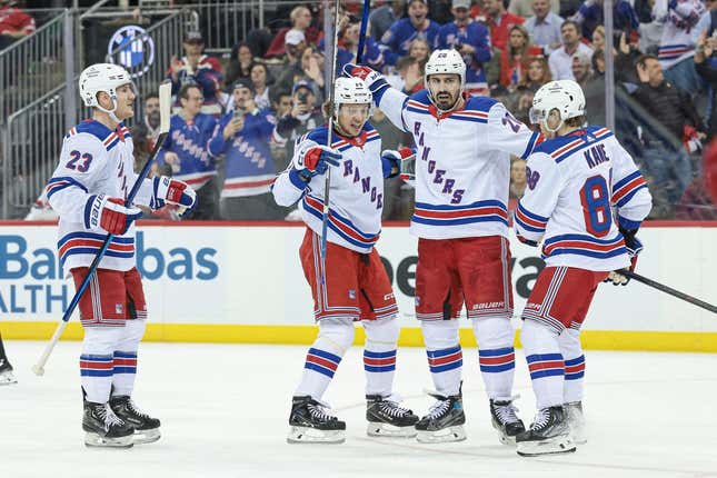 Apr 18, 2023; Newark, New Jersey, USA; New York Rangers left wing Chris Kreider (20) celebrates his second goal of the game with teammates during the third period in game one of the first round of the 2023 Stanley Cup Playoffs against the New Jersey Devils at Prudential Center.
