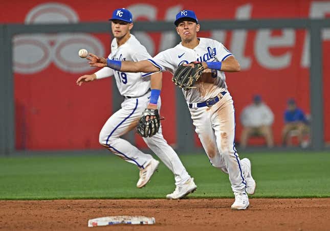 Apr 3, 2023; Kansas City, Missouri, USA;  Kansas City Royals shortstop Nicky Lopez (8) throws to first base for an out during the fifth inning against the Toronto Blue Jays at Kauffman Stadium.