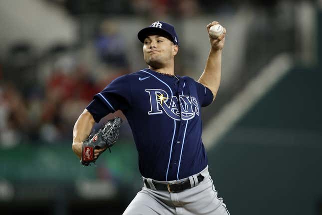 Jul 17, 2023; Arlington, Texas, USA; Tampa Bay Rays starting pitcher Shane McClanahan (18) throws a pitch in the third inning against the Texas Rangers at Globe Life Field.