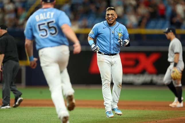 May 7, 2023; St. Petersburg, Florida, USA; Tampa Bay Rays third baseman Isaac Paredes (17) hits a walk off single against the New York Yankees in the tenth inning at Tropicana Field.
