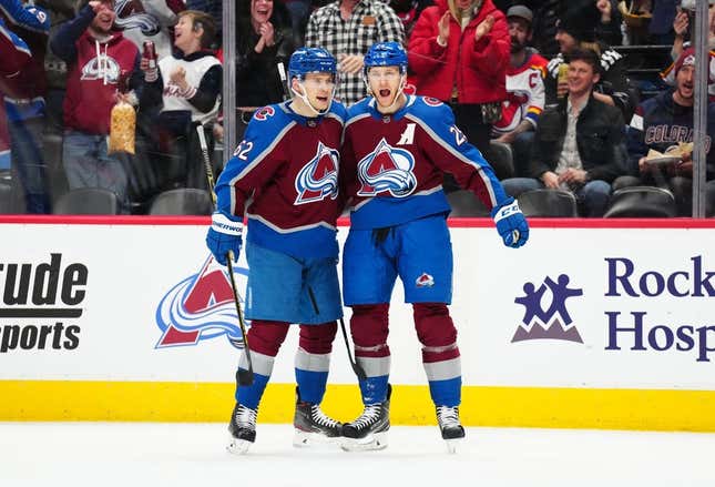 Mar 1, 2023; Denver, Colorado, USA; Colorado Avalanche center Nathan MacKinnon (29) celebrates his goal with left wing Artturi Lehkonen (62) in the second period against the New Jersey Devils at Ball Arena.
