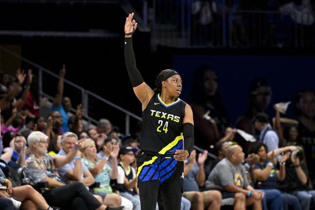 Jul 22, 2023; Arlington, Texas, USA; Dallas Wings guard Arike Ogunbowale (24) celebrates during the second half against the Los Angeles Sparks at College Park Center.