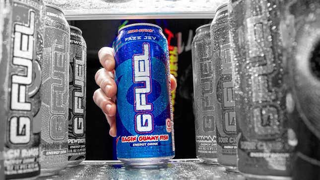 A hand grabs a blue G Fuel energy drink can out of a fridge filled with black and white gans.