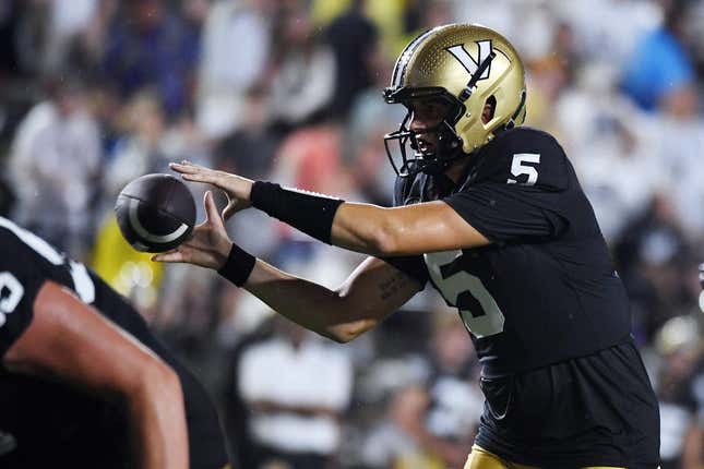 Aug 26, 2023; Nashville, Tennessee, USA; Vanderbilt Commodores quarterback AJ Swann (5) takes the snap during the first half against the Hawaii Warriors at FirstBank Stadium.