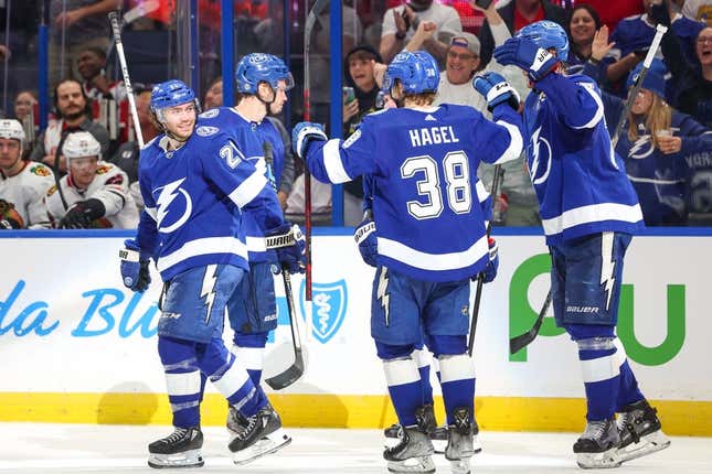 Mar 11, 2023; Tampa, Florida, USA;  Tampa Bay Lightning center Brayden Point (21) celebrates after scoring a goal against the Chicago Blackhawks in the third period at Amalie Arena.