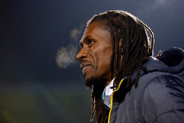 Aliou Cisse, Senegal's team coach, in a jacket in a cold environment