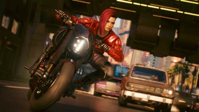 V rides a motorcycle down a busy street in Cyberpunk 2077 on PS4 to PS5.