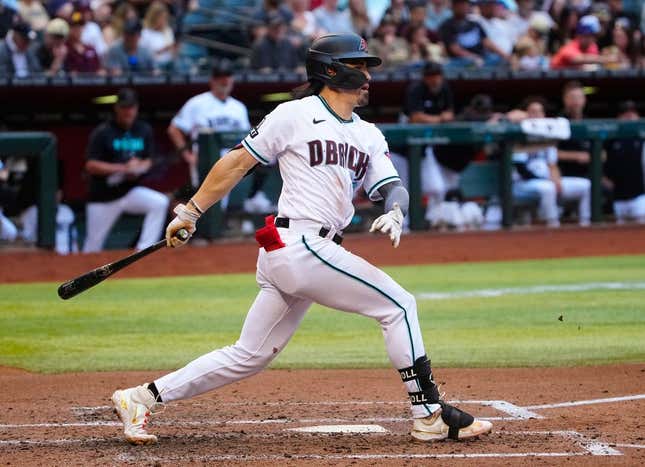 Diamondbacks Corbin Carroll (7) hits a double down the line against the Padres in the first inning during a game at Chase Field on April 22, 2023.

Mlb Padres At D Backs