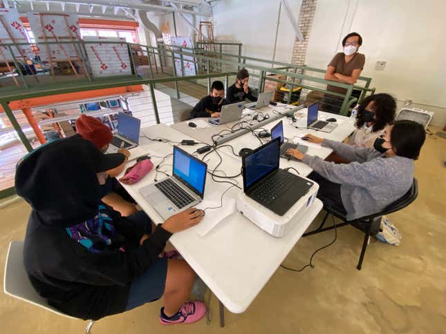 Young students learn about game creation and programming at one of The MADE's classes.