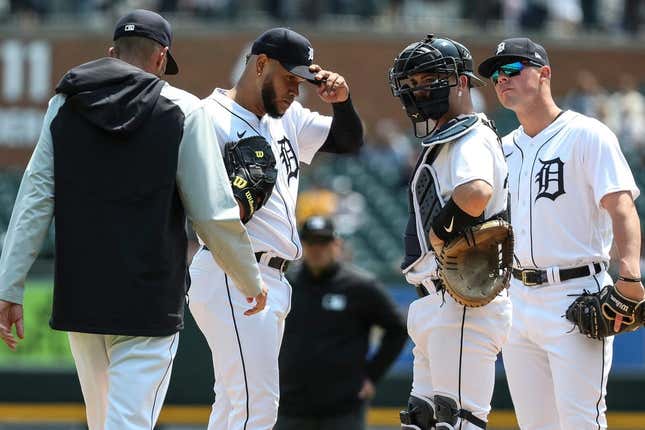 Tigers pitcher Eduardo Rodriguez meets with teammate and pitching coach Chris Fetter during the fifth inning of the Tigers' 8-0 loss on Wednesday, May 17, 2023, at Comerica Park.