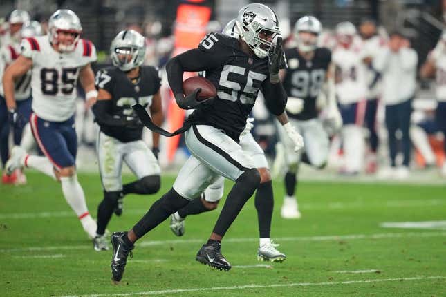 Dec 18, 2022; Paradise, Nevada, USA; Las Vegas Raiders defensive end Chandler Jones (55) returns an interception for a touchdown against the New England Patriots at the end of the second half to give the Raiders a 30-24 victory at Allegiant Stadium.