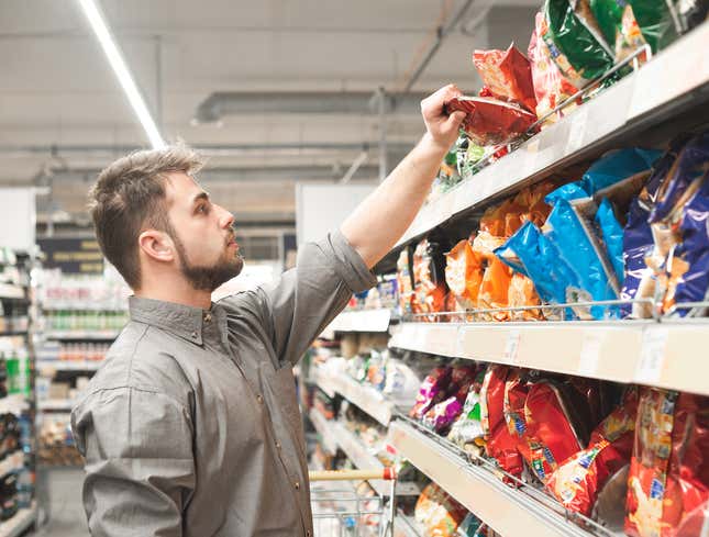 Image for article titled Man Browsing Snack Aisle Lovingly Gazes At Future Killer