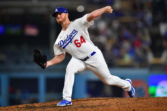 Apr 28, 2023; Los Angeles, California, USA; Los Angeles Dodgers relief pitcher Caleb Ferguson (64) throws against the St. Louis Cardinals during the sixth inning at Dodger Stadium.