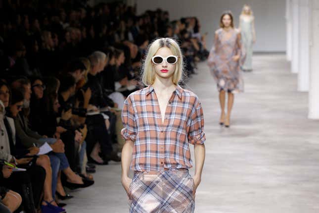 A model presents a creation by Belgian designer Dries Van Noten as part of his Spring/Summer 2013 women's ready-to-wear fashion show during Paris fashion week September 26, 2012.