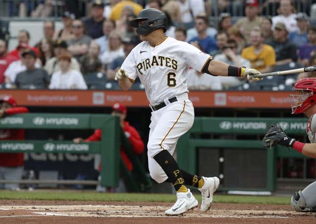 Apr 21, 2023; Pittsburgh, Pennsylvania, USA; Pittsburgh Pirates second baseman Mark Mathias (6) hits a two run single against the Cincinnati Reds during the second inning at PNC Park.