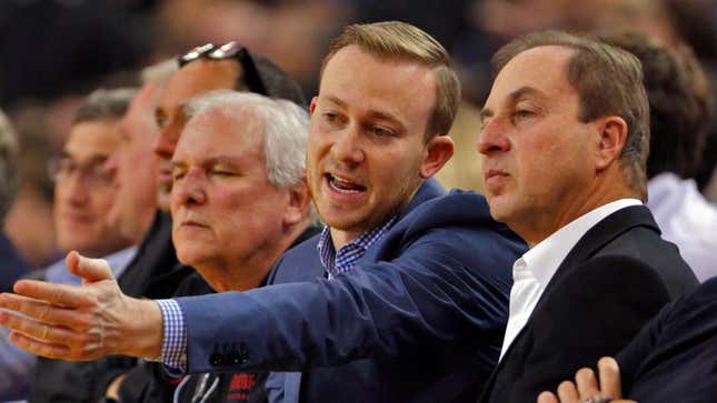 Joe Lacob, right, and son Kirk Lacob sit courtside in the first half as the Golden State Warriors played the Brooklyn Nets at Oracle Arena in Oakland, Calif., on Tuesday, March 6, 2018.
