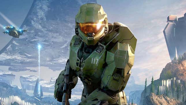 Master Chief in the box art of Halo: Infinite, standing on the ring of Zeta Halo. 