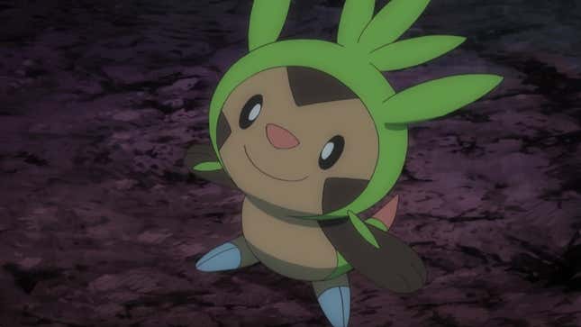 Chespin is seen standing on a rocky floor and smiling up at something.
